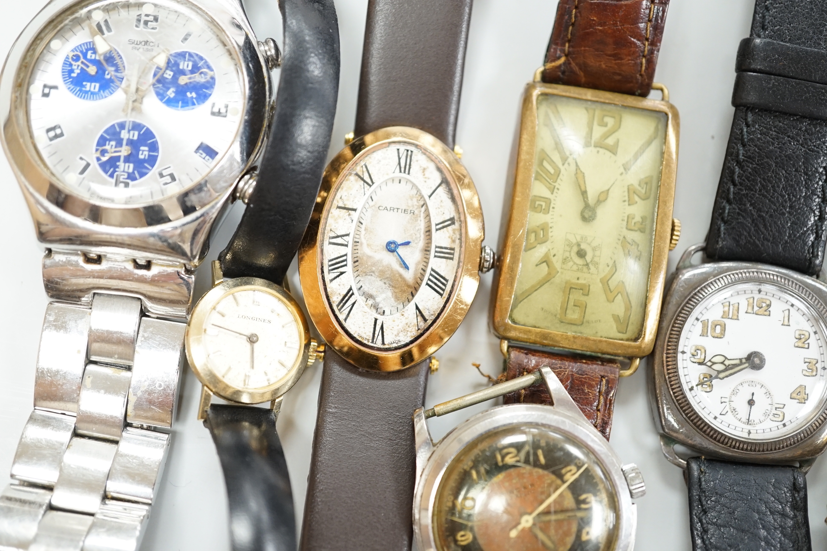 Five gentleman's assorted wrist watches including Swatch and early 20th century white metal and two lady's wrist watches.